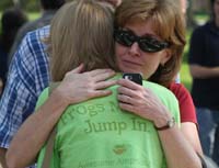 parent hugging student at orientation