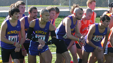 Prairie Fire men's cross country team on the line preparing for competition.