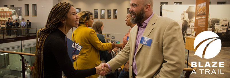 A Knox student and alumnus connect at a Bastian Family Center for Career Success event