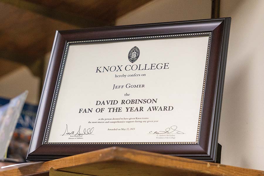 The David Robinson Fan of the Year Award certificate framed on Jeff's shelf in his office.