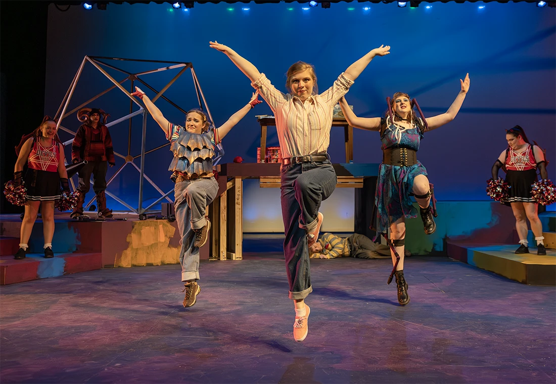 Students performing on stage during Rep Term.