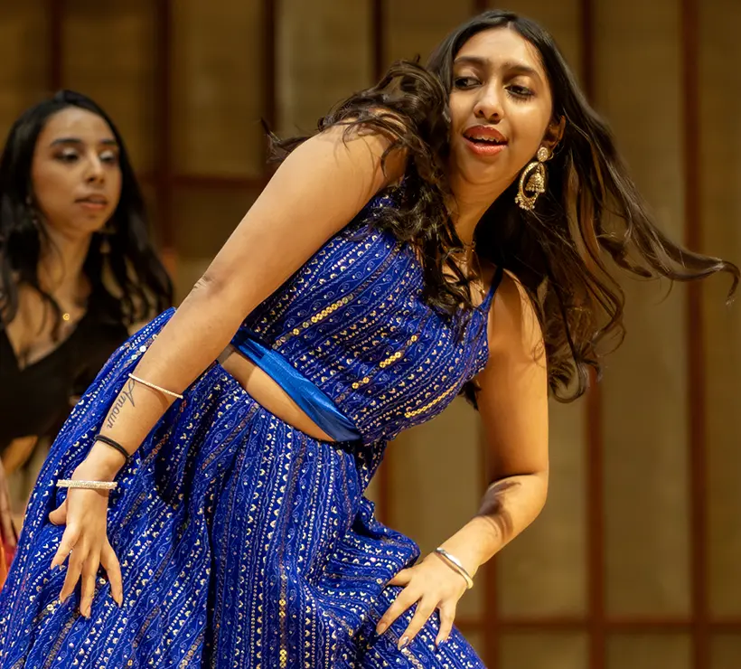 Ashel Dsouza dancing at the International Fair