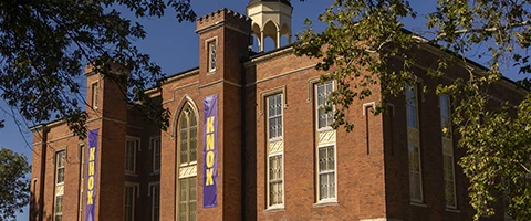 The south side of Knox College's Old Main in the summer sun.