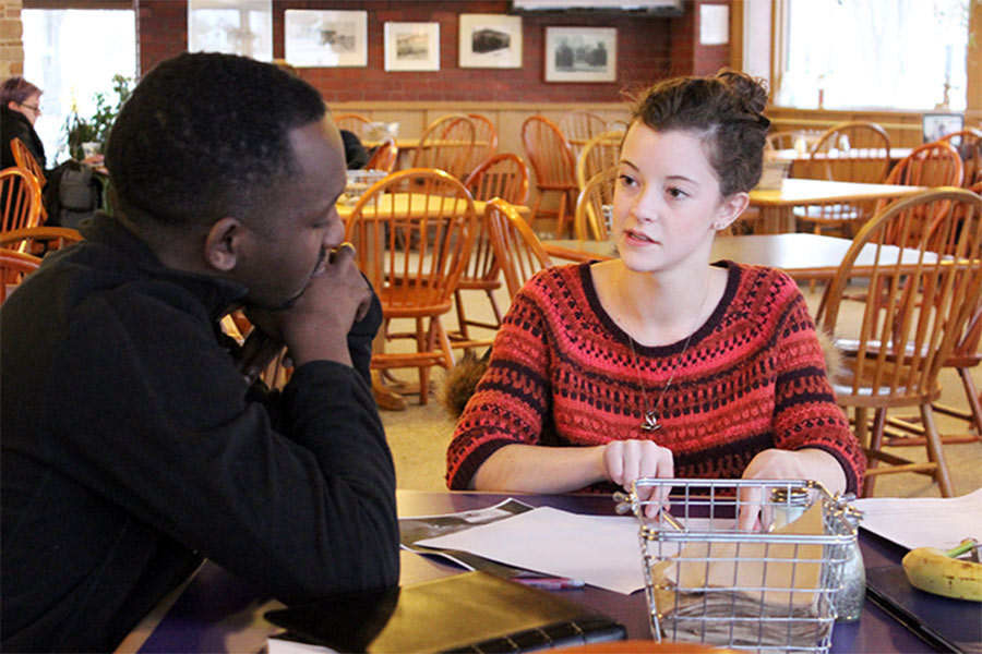 Knox senior Lindsey Morgan interacts with a African American French speaker as part of her senior research project. 